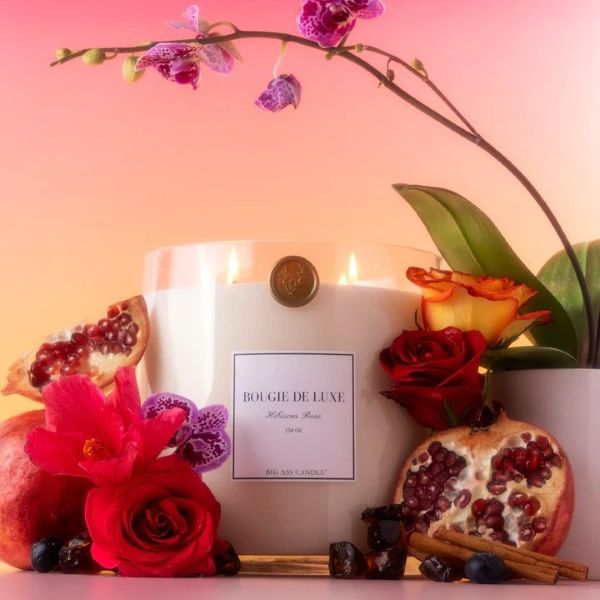 Big Ass Candle surrounded by Florals depicting its fragrances