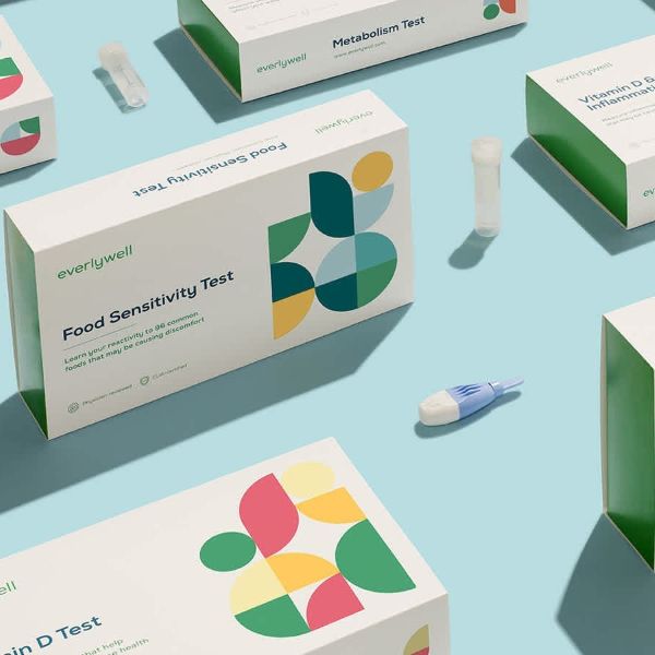 Everlywell Testing product packaging, boxes on blue background.