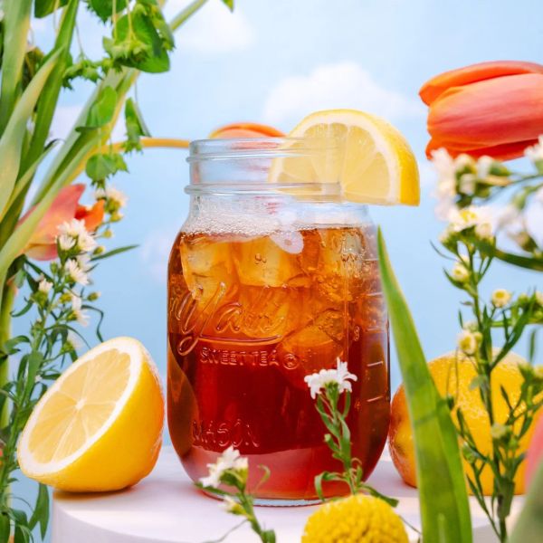Glass of Tea surrounded by Florals